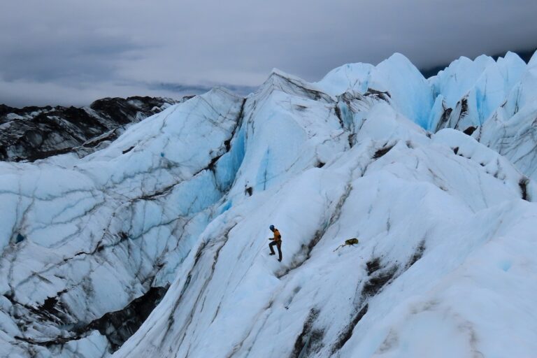 A lone climber on a glacier