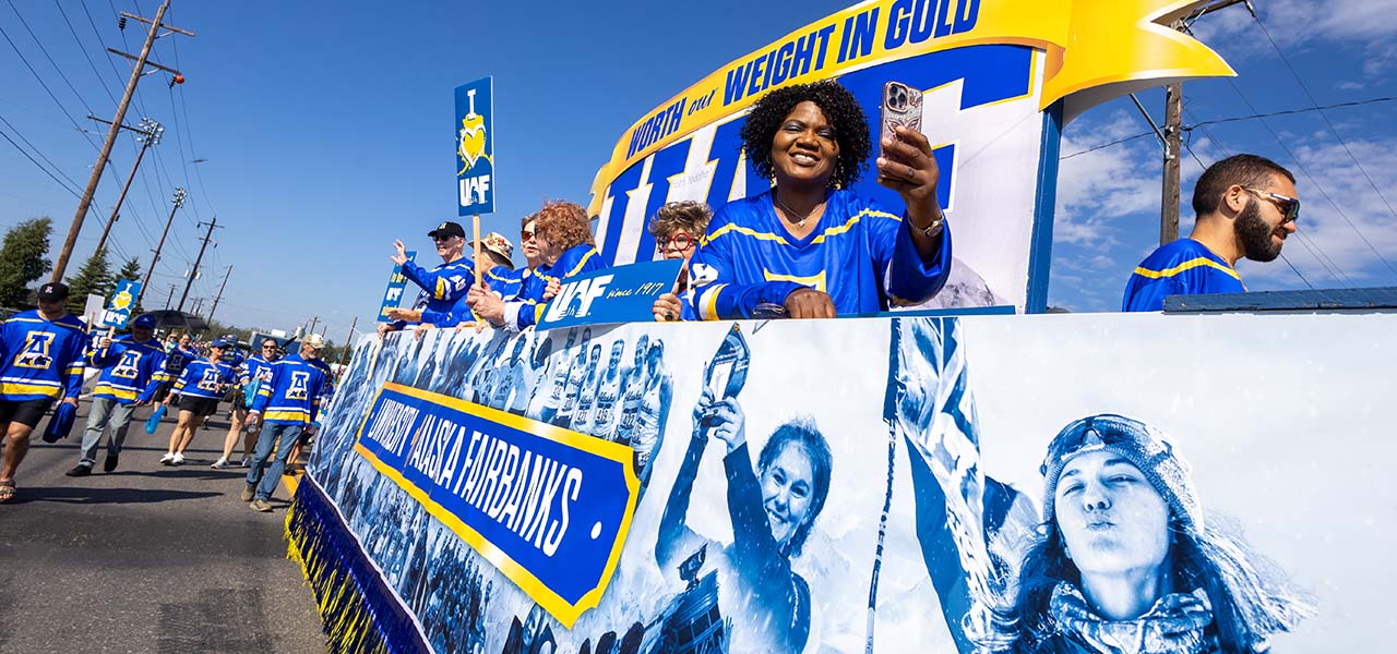 People on the UAF float in the 2025 Golden Days parade.